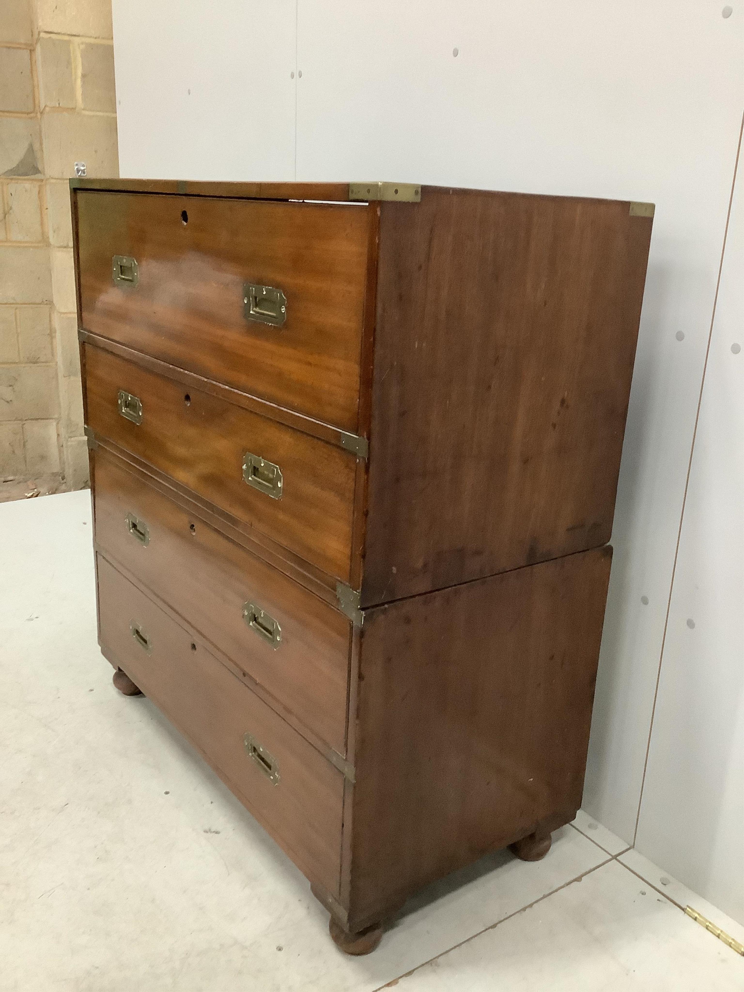 A Victorian brass mounted mahogany two part secretaire military chest with later pigeonhole interior, width 98cm, depth 47cm, height 109cm. Condition - fair, lacking all escutcheons